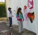 “Mahow & Fi” realizando su obra en grafitti